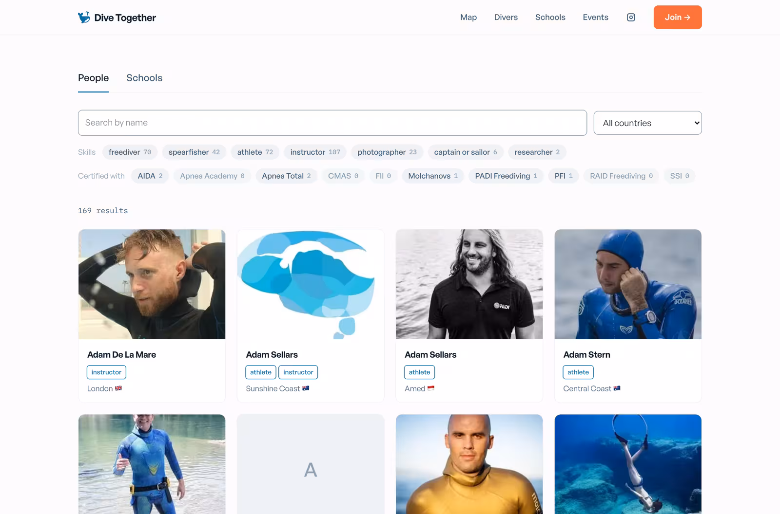 The Dive Together people directory, showing member cards with photos, skills, and locations, above filters for skill and certification agency